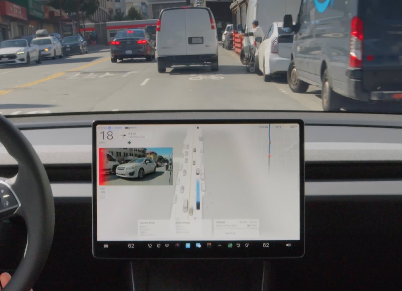 A Tesla Model Y driving under Full Self-Driving