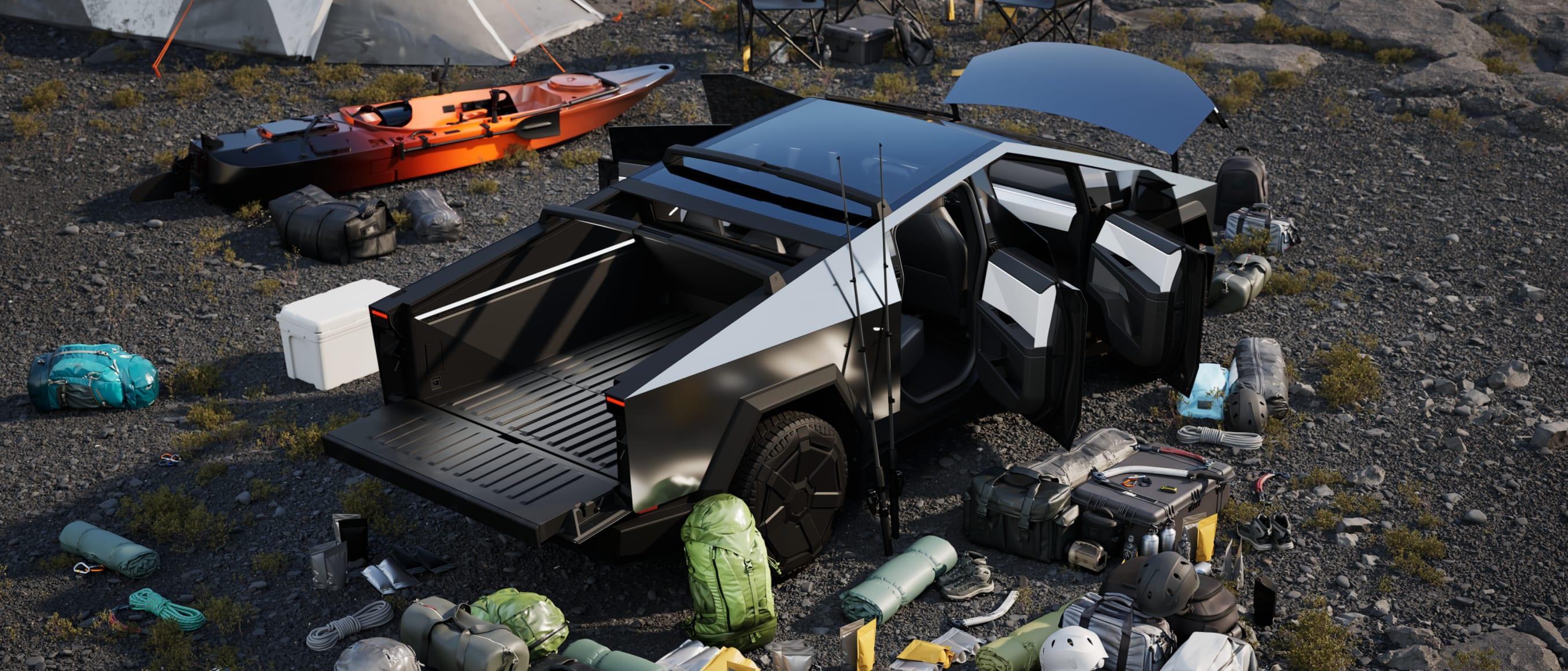 Tesla Cybertruck at a campsite — bed open, gear staged, doors up