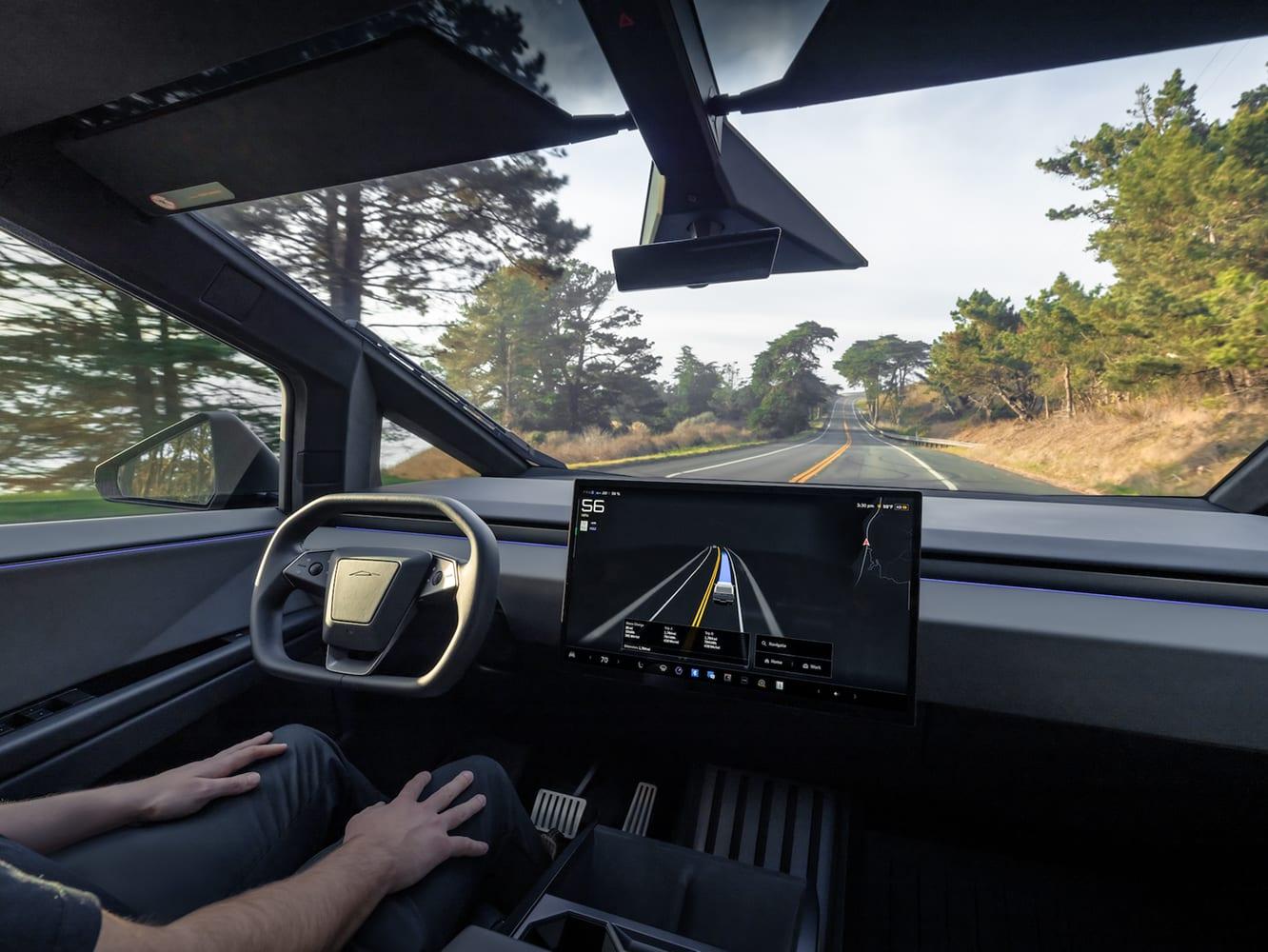 Tesla Cybertruck cockpit on the road — commercial fleet driving
