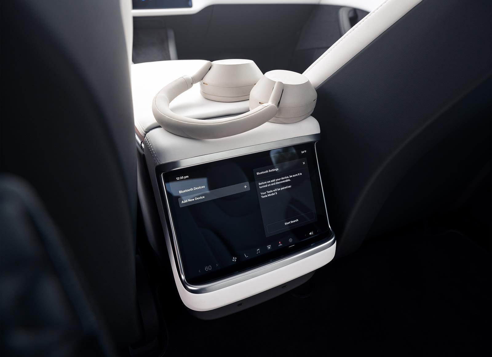 Tesla Model X rear touchscreen with wireless headphones
